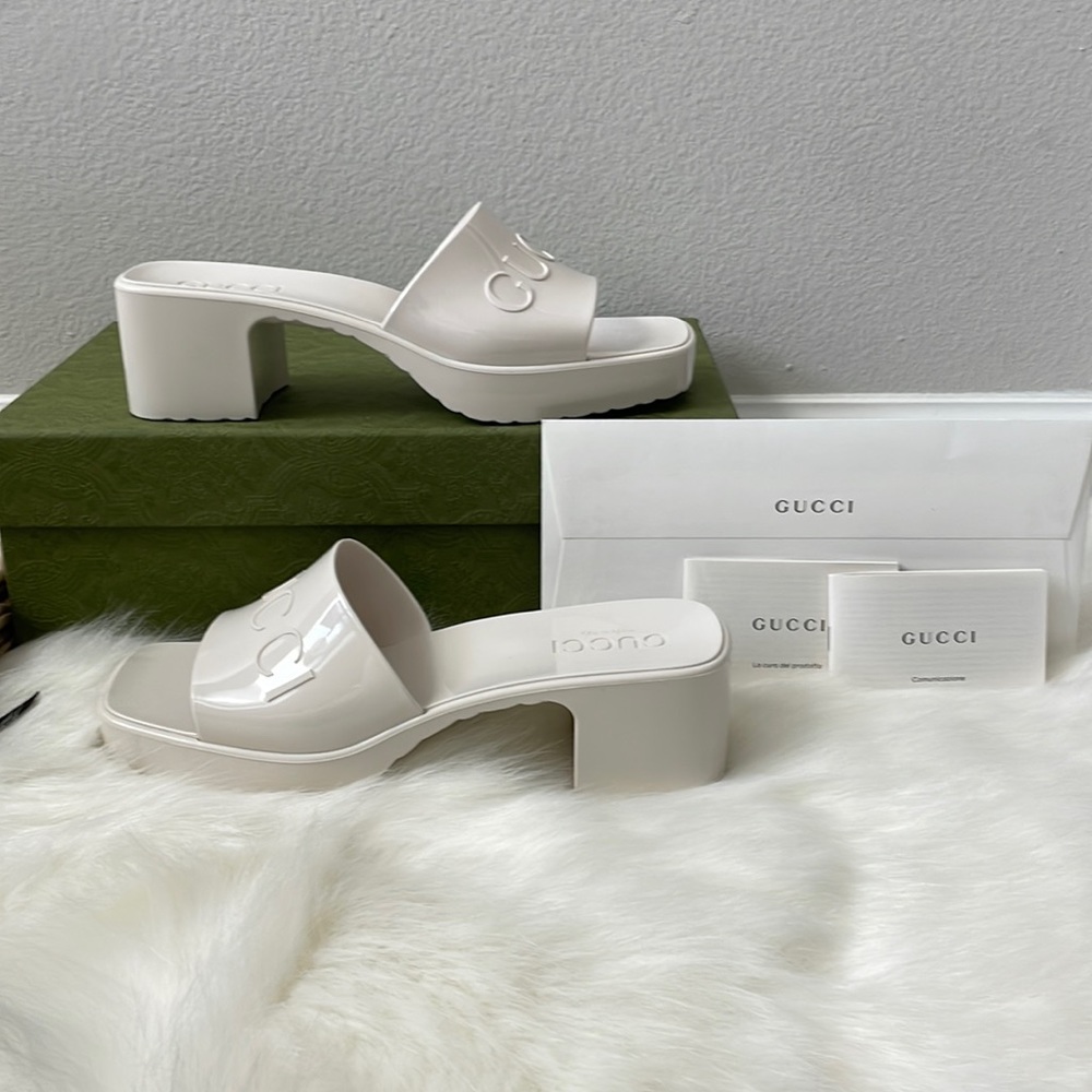 100 percent authentic Gucci rubber slides in mystic white